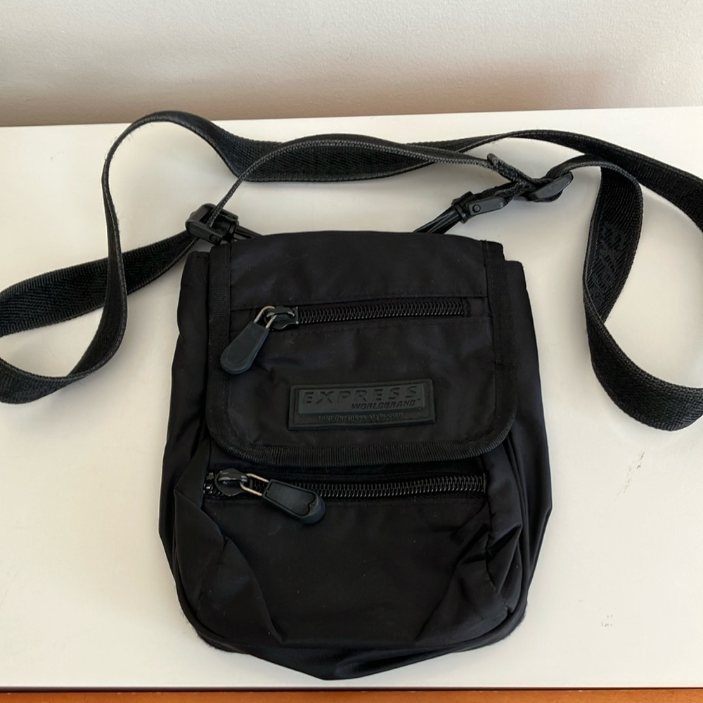 Express Black TravelBag with Adjustable Straps and Compact Design